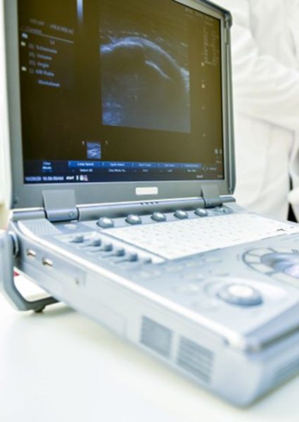 Doctor using ultrasound to administer barbotage