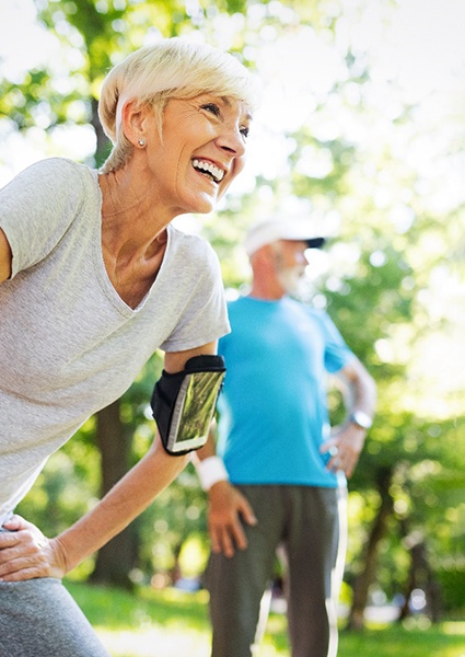 Older couple enjoying exercise with help of homeopathic medicine