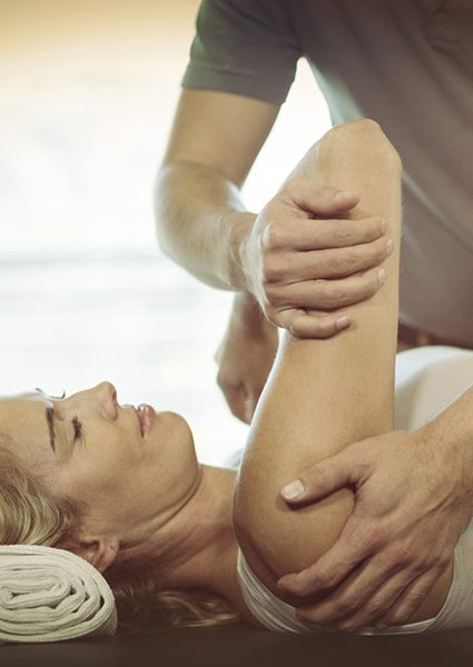 Patient undergoing Muscle Energy Technique treatment in Hollywood