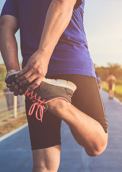 Man stretching before going for a run